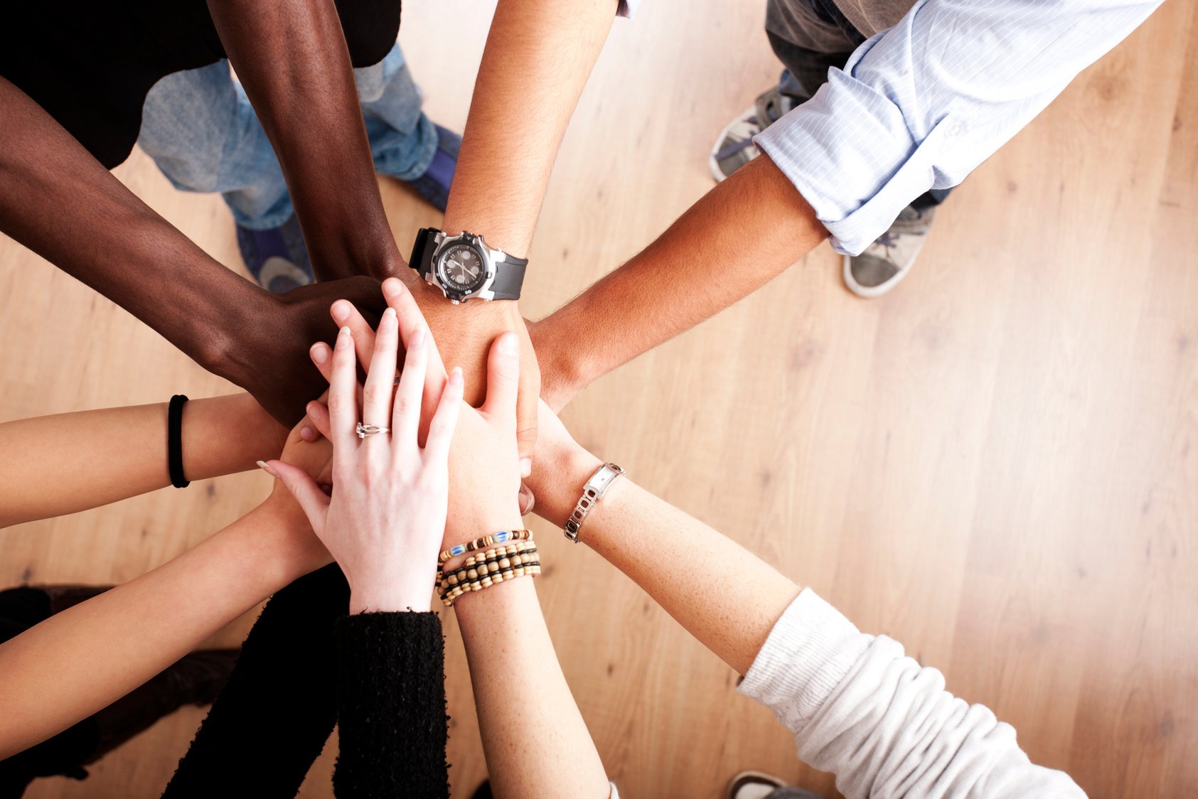 Group with hands together